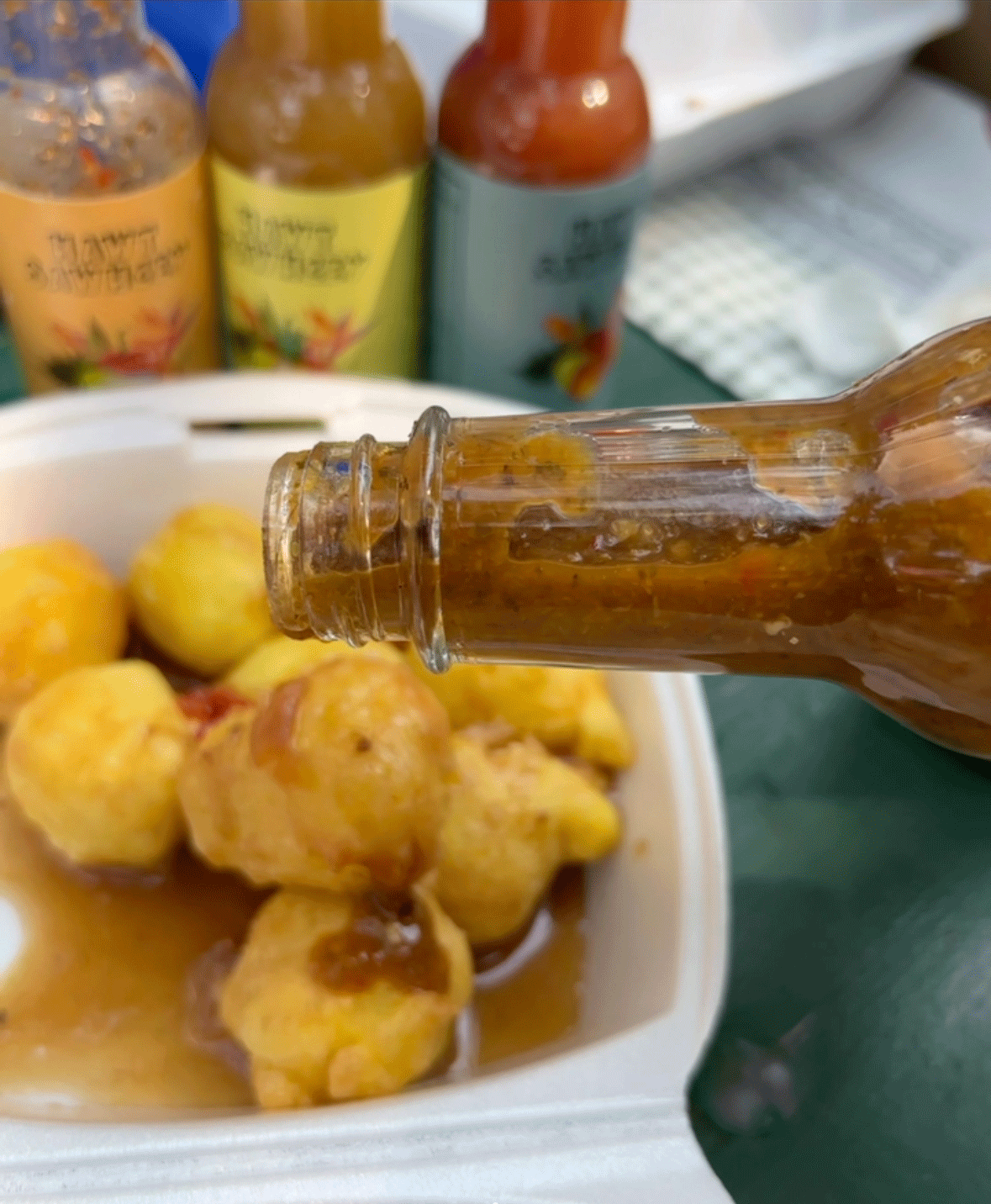 Plenty Peppa hot sauce served with pholourie